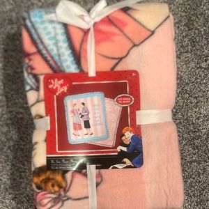 Brand new tie blankets in package